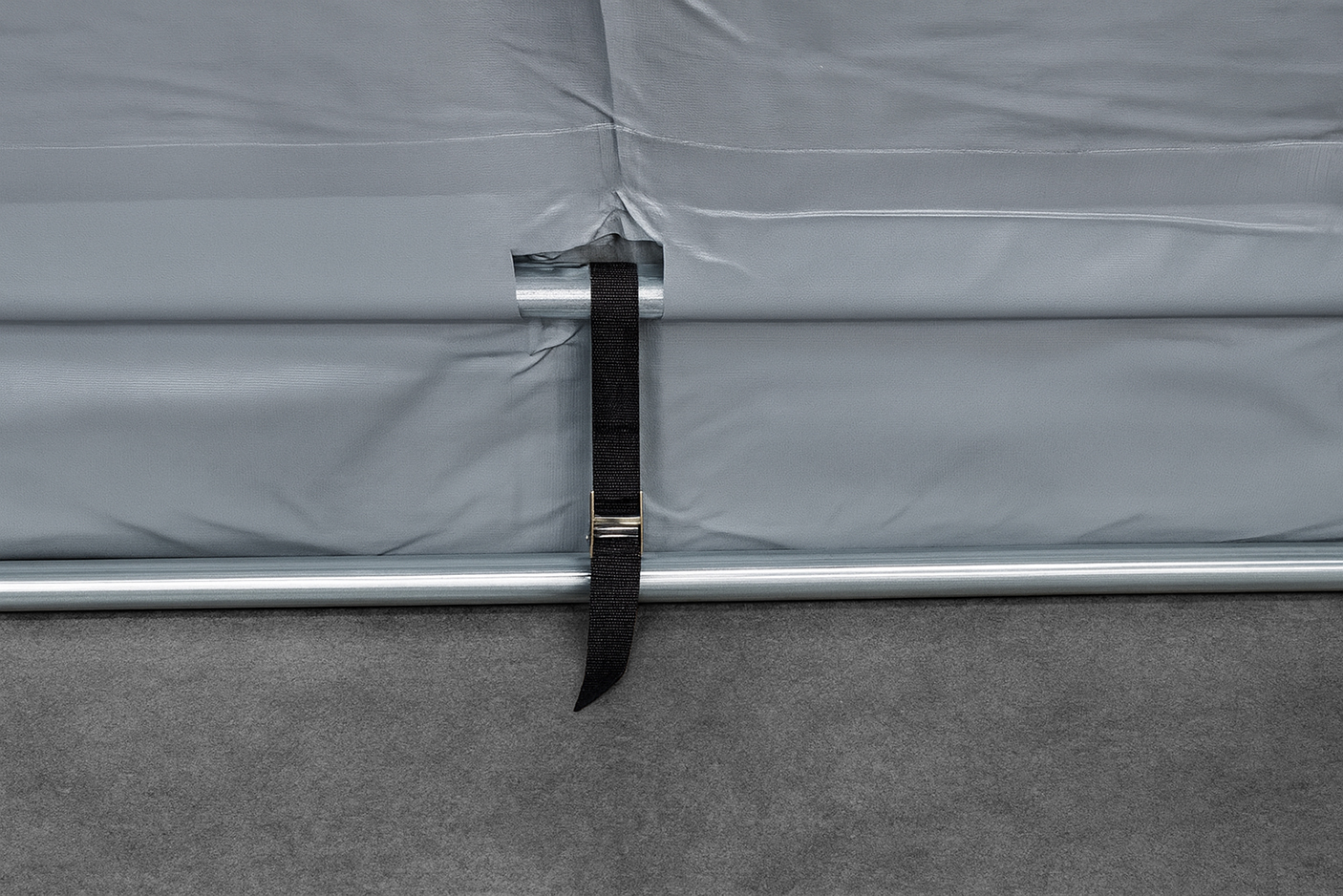 Cam strap industrial tent