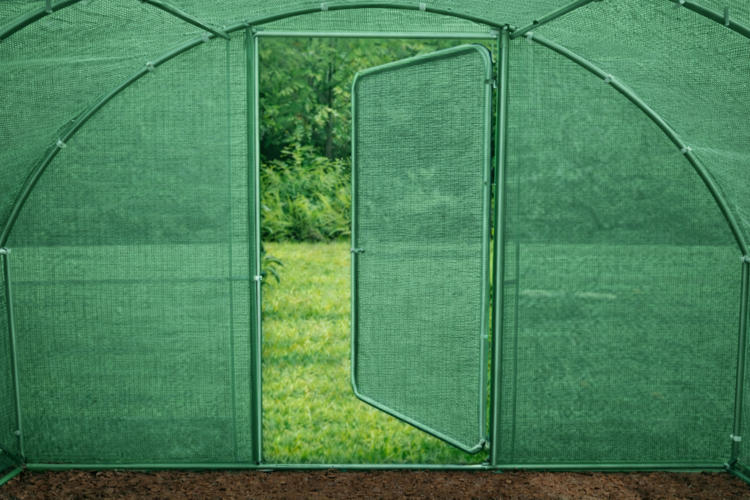 Green door open poly tunnel